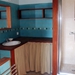 Salle de douche avec douche et machine  laver